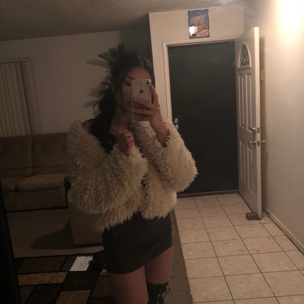 Cute oversize furry jacket.